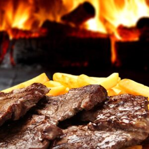 Телешко на скара с картофи пред камина