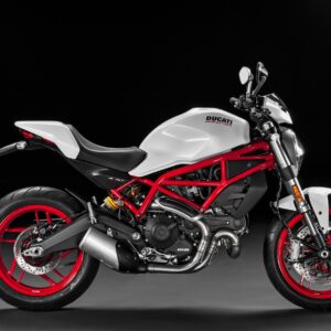 Бял Ducati Monster с червена рамка върху черен фон