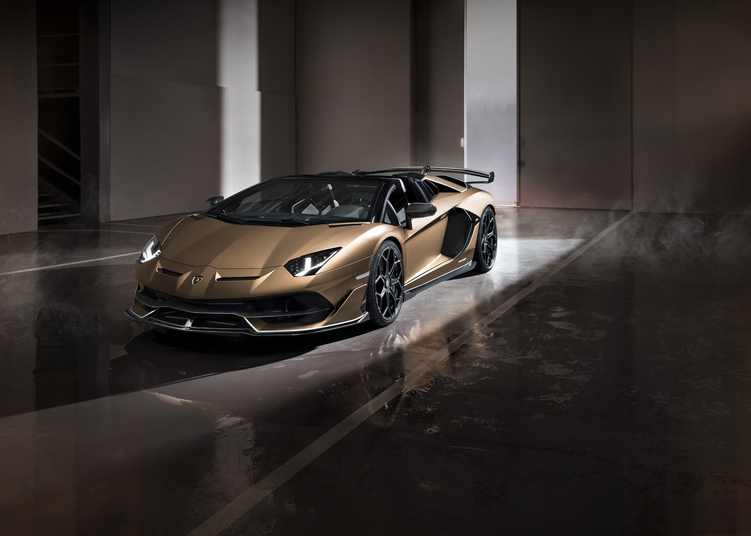 Bronze Lamborghini Aventador luxury supercar dramatic light