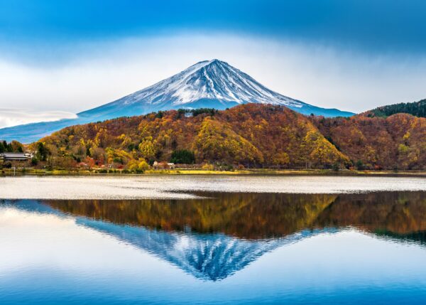 Autumn reflection of Mount Fuji with colorful trees.