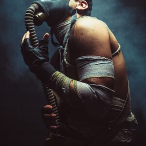 Man with gas mask and bandages portrait.