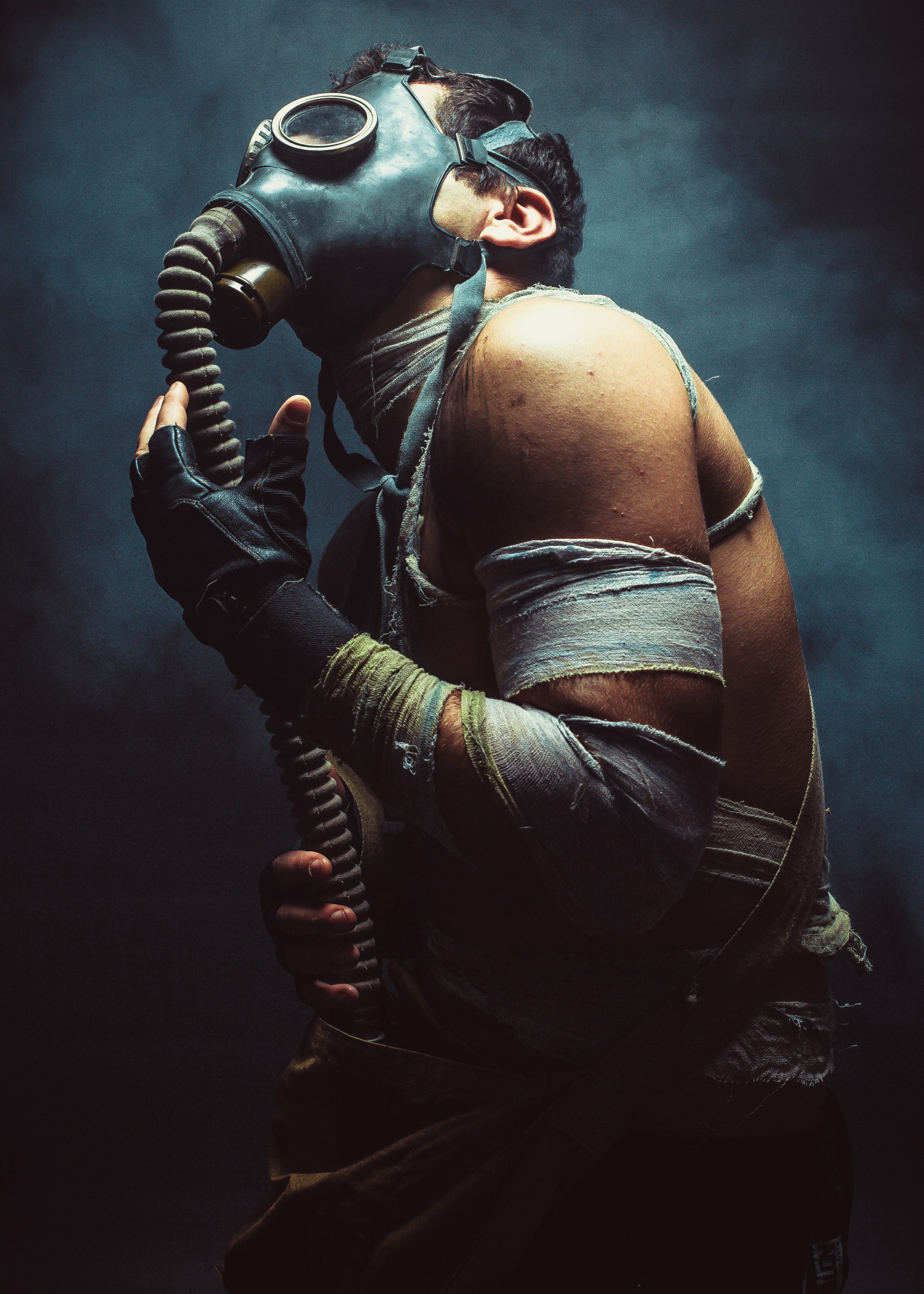 Man with gas mask and bandages portrait.