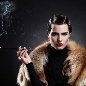 Vintage female portrait with fur coat and cigarette.